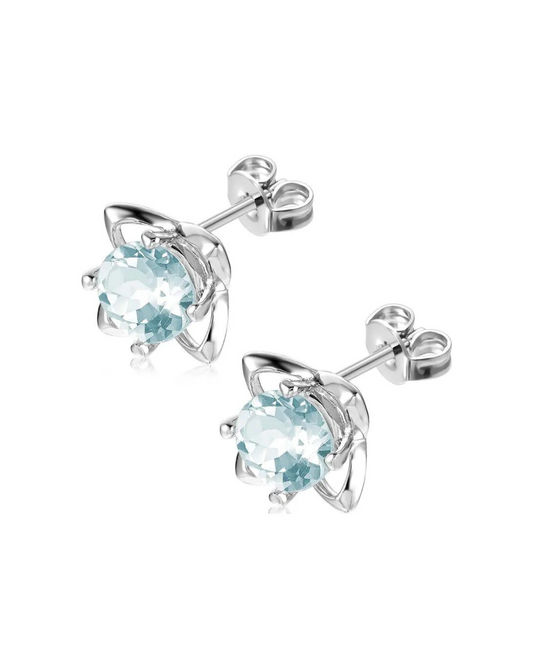Aretes Estrella con Topacio Sky Blue en Plata 925 y Baño de Oro Blanco de 18 kt.