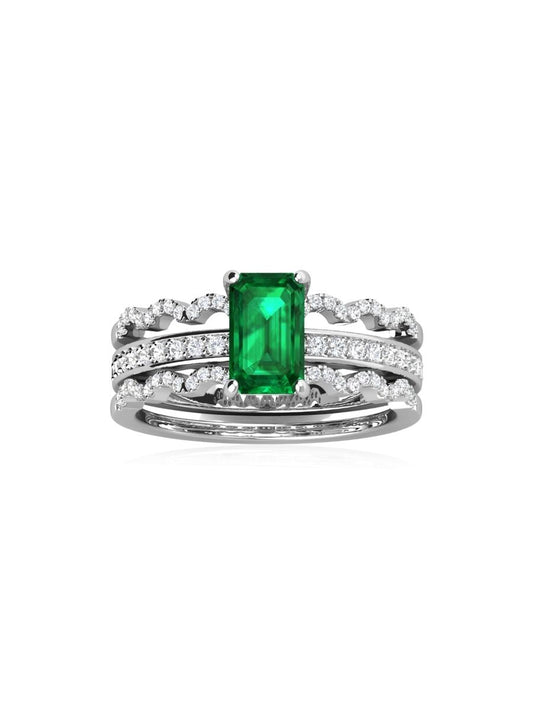 Anillo Trilogía Estelar con Esmeralda en Plata 925 y Baño de Oro Blanco de 18 kt.