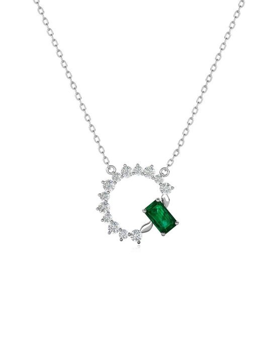 Collar Aurora con Esmeralda en Plata 925 y Baño de Oro Blanco de 18 kt.