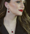 Aretes Rubí Corindón y Zafiros Blancos en Plata 925 y Baño de Oro Blanco de 18 kt.