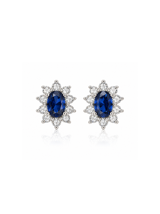 Aretes Diana con Zafiro Azul en Plata 925 y Baño de Oro Blanco de 18 kt