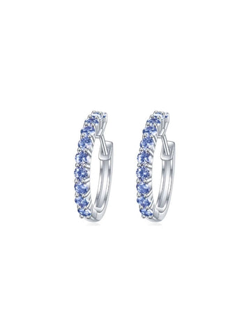 Arracadas Eternidad con Zirconia Azul Celeste en Plata 925 y Baño de Oro Blanco de 18 kt.