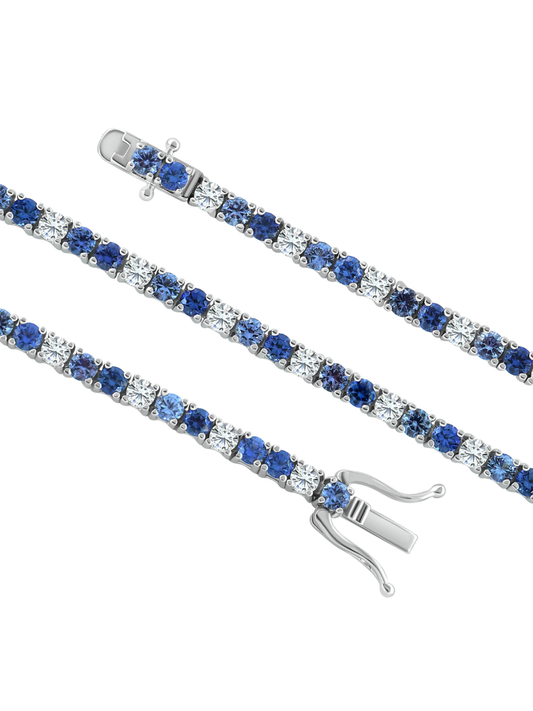 Brazalete Tennis de 3 mm con Zafiro Azul y Diamante Moissanite en Plata 925 con Baño de Oro Blanco de 18 kt Diana